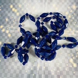Very cool vintage long strand of geometric shaped plastic beads. Hong Kong 48”